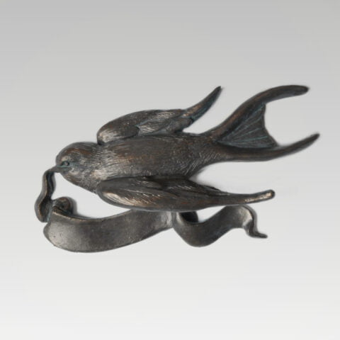 Zwaluw met lint patina