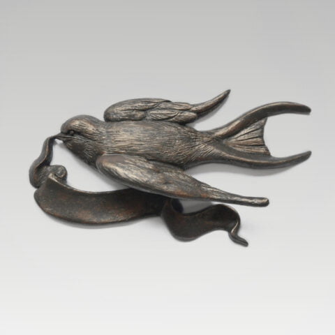 Zwaluw met lint brons